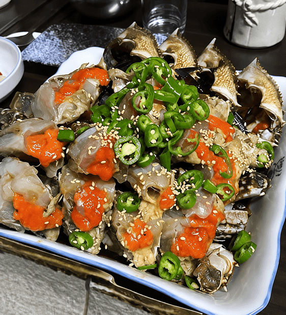 Soy-marinated crab dressed with chilli, spring onion and sesame.