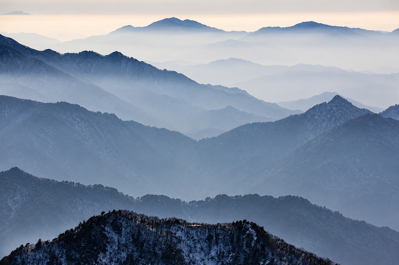 Ridges of Deogyusan seen from the Sangsan overlook under a summer sky.